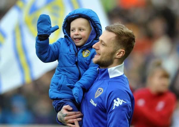 Toby Nye with Leeds United's Liam Cooper