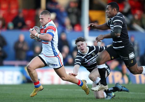 Wakefield Trinity's Ryan Hampshire in action against Hull FC.