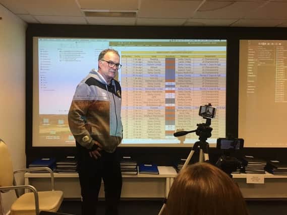 Marcelo Bielsa shows off his stats in the unusual Spygate press conference. Photo: Phil Hay
