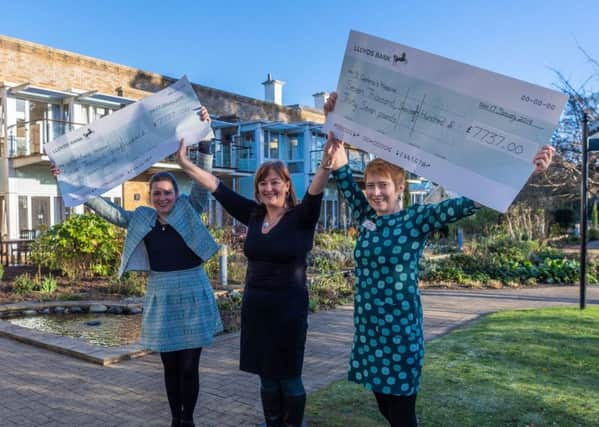 Kate Bratt-Farrar and Kerry Jackson, from Wheatfields and St Gemma's respectively, receive their cheques from YEP editor Hannah Thaxter, centre.