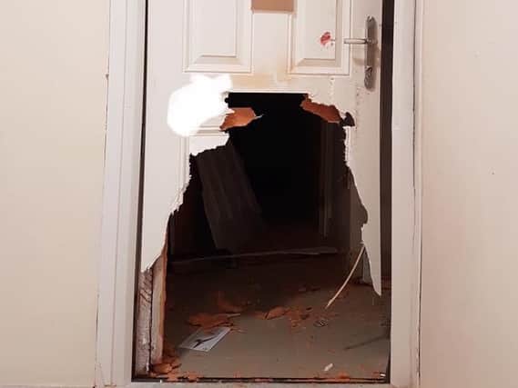 The door which was broken down in Leeds. Photo: West Yorkshire Police/Facebook