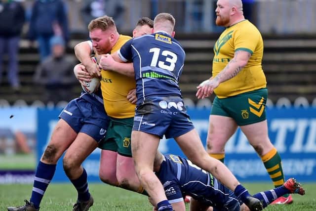 Hunslet Club Parkside's James Healey in action against Featherstone Rovers.