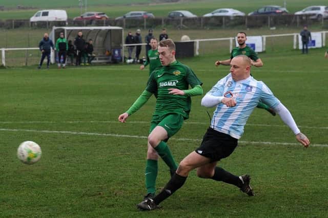 Scott Armstrong scores for Carlton in a 2-2 draw with visitors Beeston St Anthony's. PIC: Steve Riding