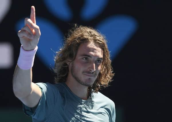 Greece's Stefanos Tsitsipas celebrates after defeating Spain's Roberto Bautista Agut. Picture: AP/Andy Brownbill