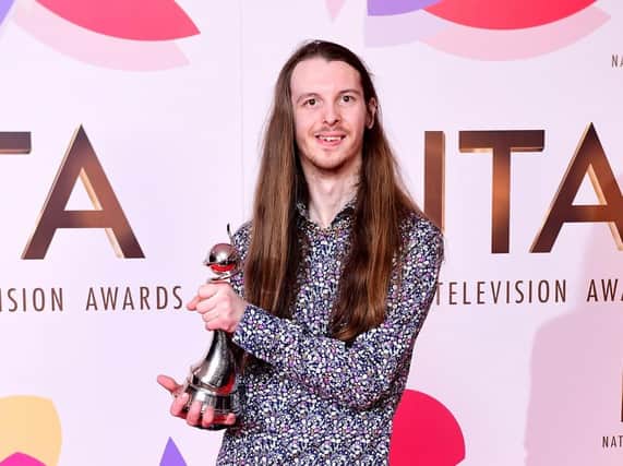 Emmerdale actor James Moore with his award