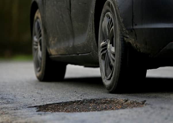 Potholes causing van drivers hundreds of pounds worth of damage