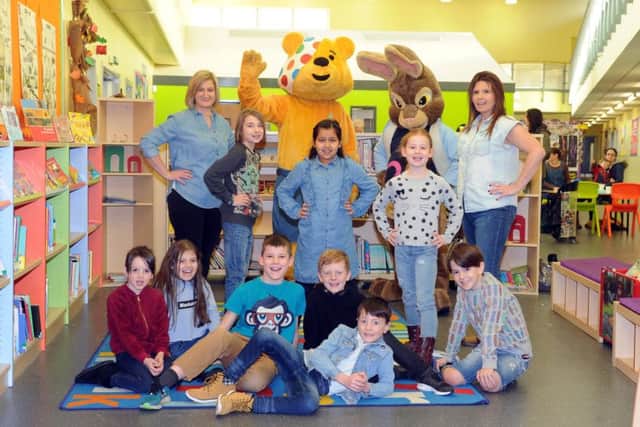 BLUE: Staff and the school council at Pudseys Waterloo Primay School sport their denim clothing. PIC: Tony Johnson