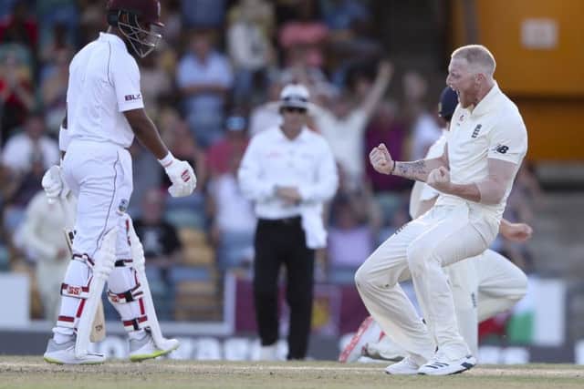 England's Ben Stokes celebrates taking the wicket of West Indies' Shai Hope during the Windies second innings.