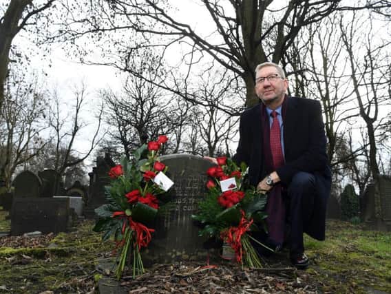 Unite boss Len McCluskey at Tom Maguire's grave in Leeds.