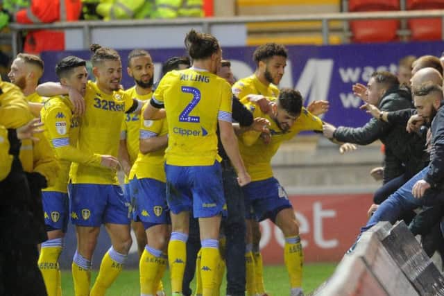 Leeds United celebrate Mateusz Klich's late winner at Rotherham United.