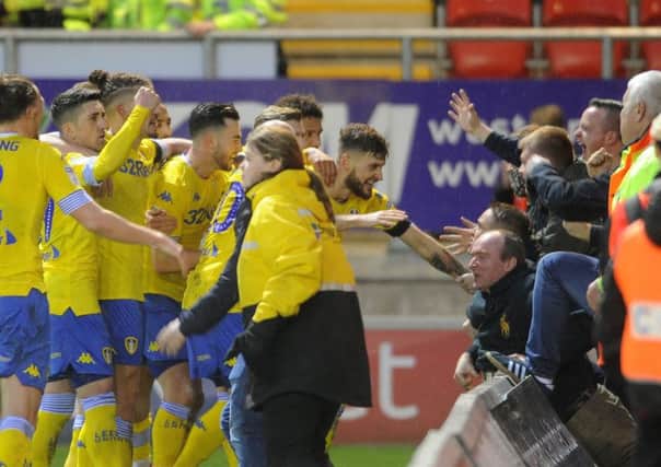 YOU'RE THE MAN: Midfielder Mateusz Klich celebrates scoring the winning goal with the Leeds United fans at the New York Stadium. Picture: Simon Hulme