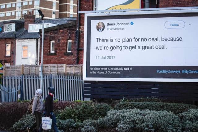 A protest group has put up billboards across Leeds highlighting comments made by Leave MPs