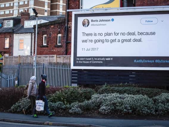 A protest group has put up billboards across Leeds highlighting comments made by Leave MPs