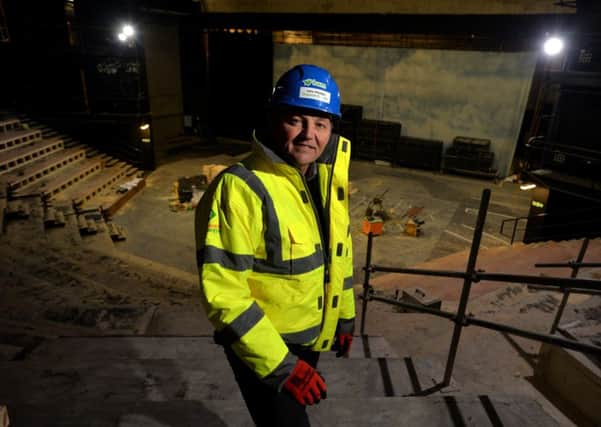 John Phillips, regional director of construction firm BAM, in the auditorium of Leeds Playhouse which is being renovated by BAM.  Picture Bruce Rollinson