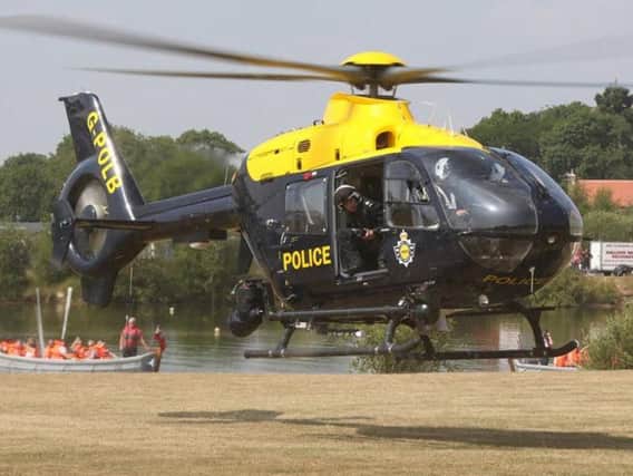 A police helicopter touches down (file photo). The NPAS Carr Gate was called out twice tonight