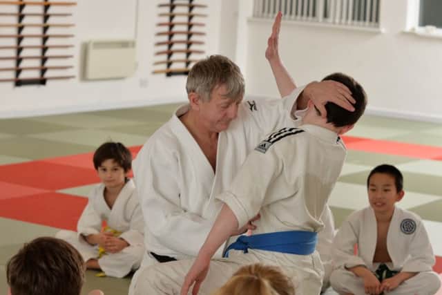 Martial Arts Instructor Bob Jones works with a pupil at Ichiban Leeds in Meanwood  Picture: Bruce Rollinson
