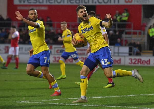 Kemar Roofe and Mateusz Klich celebrate Leeds United's equaliser against Rotherham on Saturday. Picture: Dave Howarth/PA Wire.