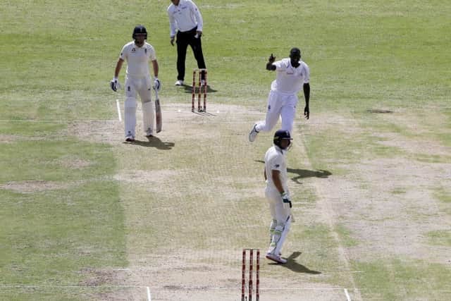 West Indies' captain Jason Holder celebrates the dismissal of England's Jos Buttler in Antigua. Picture: AP/Ricardo Mazalan