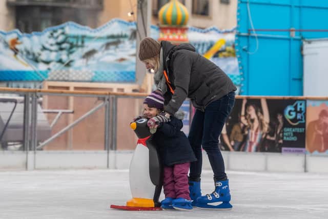 Opening of Ice Cube Leeds in Millennium Square, Leeds. Pictured Karen Woodford, having fun with daughter Amalie, aged 3, of Roundhay, Leeds.