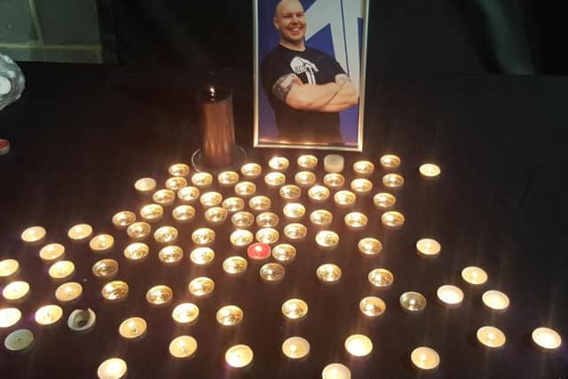 A vigil was held for John Harkins at his local gym shortly after his tragic death