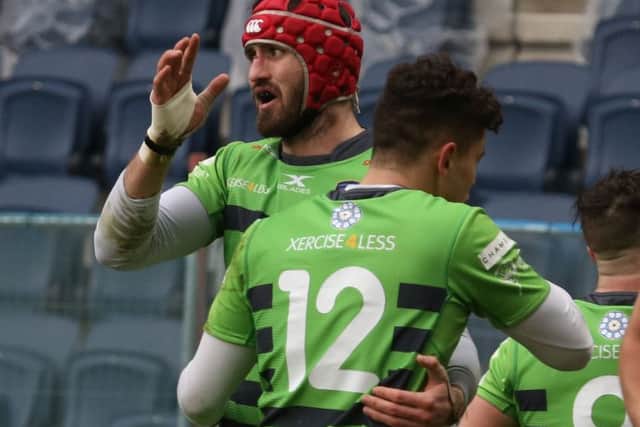 CHEERS: Dam Temm is congratulated on his try by Jacob Umaga. PIC: Varley's Picture Agency