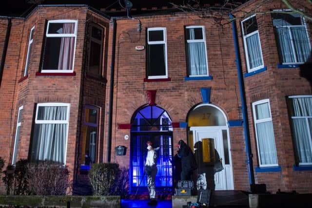 The team - who had been at the property for over an hour - also used ultra-violet light and torches on the front door. PIC: SWNS