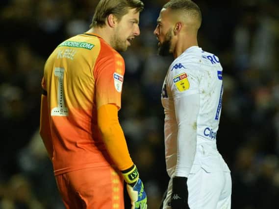 Norwich City goalkeeper Tim Krul and Leeds United's Kemar Roofe exchange words after Krul's clash with Patrick Bamford on Saturday.