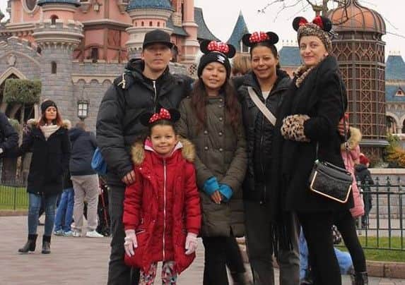 Vicki Aldwin (right) with family on a trip to Disneyland Paris