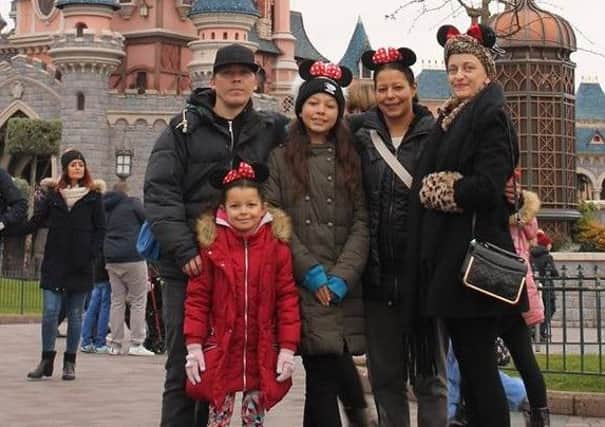Vicki  Aldwin (right) with family on a trip to Disneyland Paris