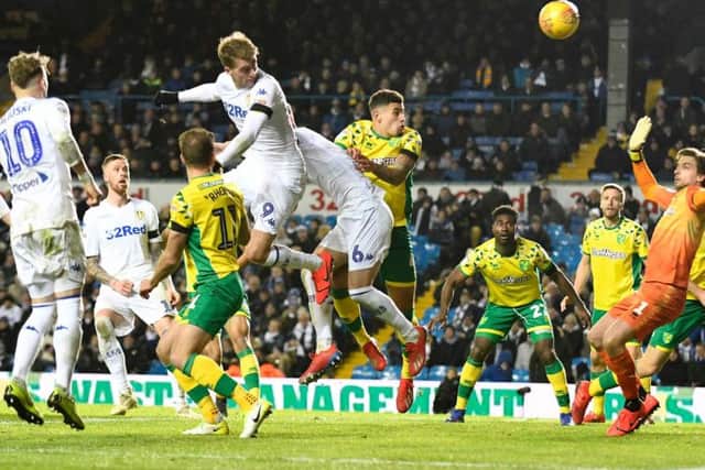 Patrick Bamford nods in an injury-time header during Leeds United's 3-1 defeat to Norwich City.