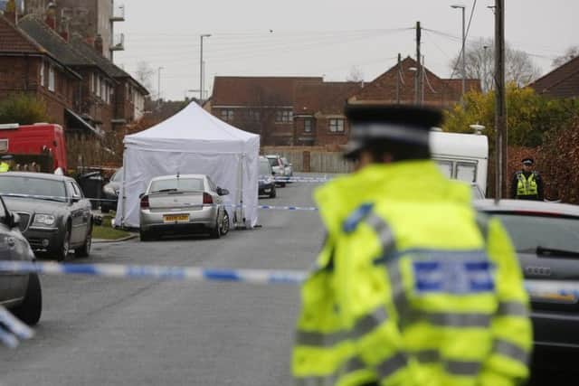 Police are looking to pay people to guard crime scenes (file photo)