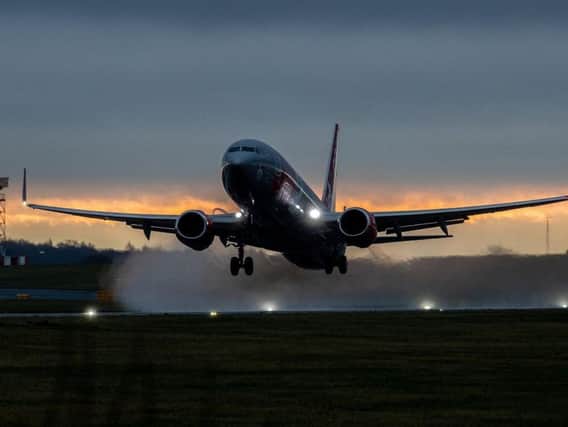 Aircraft Landing at Leeds Bradford international airport with a cross wind as the weather is forecast to get worse for the UK. Copyright: Charlotte Graham