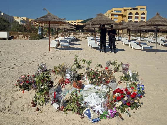 Tributes left after the slaughter of 30 Britons when extremist Seifeddine Rezgui opened fire in Sousse on June 26 2015, shooting 38 people dead. Picture by Steve Parsons/PA Wire.