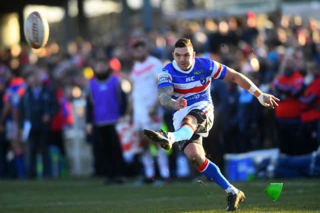 Wakefield's Danny Brough kicks a goal. He was also sin-binned in the first half. PIC: Jonathan Gawthorpe