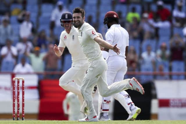 England's Mark Wood celebrates taking the wicket of West Indies' Shai Hope in St. Lucia. Picture: AP/Ricardo Mazalan