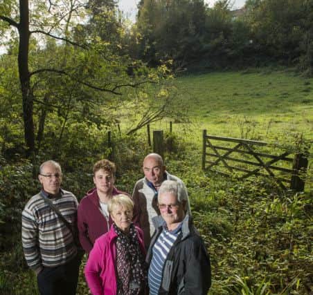 Picture by Allan McKenzie/YP - 10/10/2014 - Press - Gledhow Valley Woods Planning Protest - Chapel Allerton, Leeds, England - Martin Calvert, Peter & Robbie Foulston, Joan & Mervyn Clayton of the Friends of Gledhow Valley Woods at the site of the planning objection.