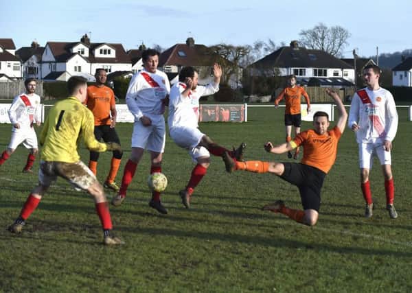 Captain Richard Parry opens the scoring for Otley Town in the 4-0 win over Division One rivals and visitors Leeds Modernians. PIC: Steve Riding