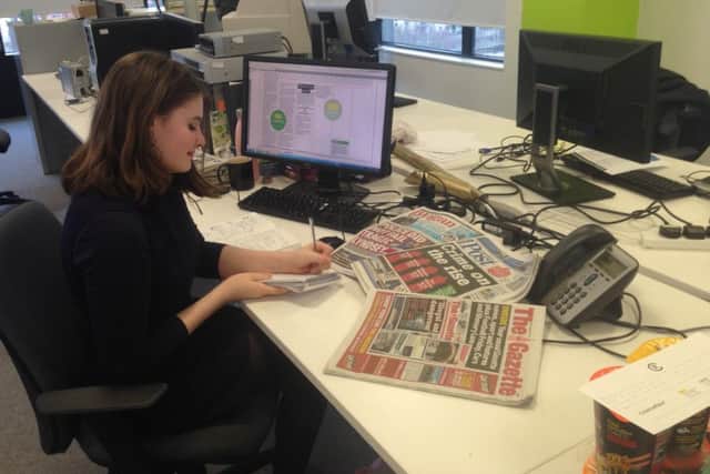 JPI Media apprentice journalist Natasha Meek at work.