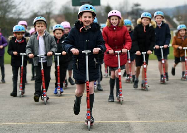 Hundreds of scooters are being given to primary schools across Leeds as part of an energetic new scheme to tackle air pollution and protect the health of children in the city.
The scheme will encourage children to swap four wheels for two and scoot to school instead of being driven. Pupils from Pool-in-Wharfedale CE Primary School. try them out.
12th February 2019.
Picture Jonathan Gawthorpe