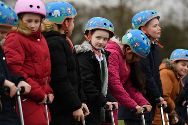 Hundreds of scooters are being given to primary schools across Leeds as part of an energetic new scheme to tackle air pollution and protect the health of children in the city.
The scheme will encourage children to swap four wheels for two and scoot to school instead of being driven. Pupils from Pool-in-Wharfedale CE Primary School. try them out.
12th February 2019.
Picture Jonathan Gawthorpe