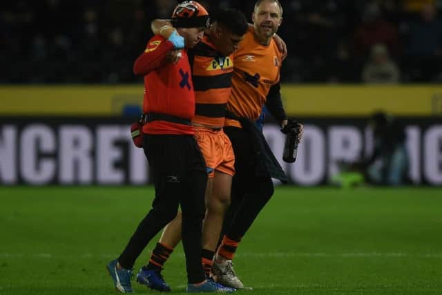 Injured Mitch Clark is taken off the pitch at Hull. Picture: Matthew Merrick