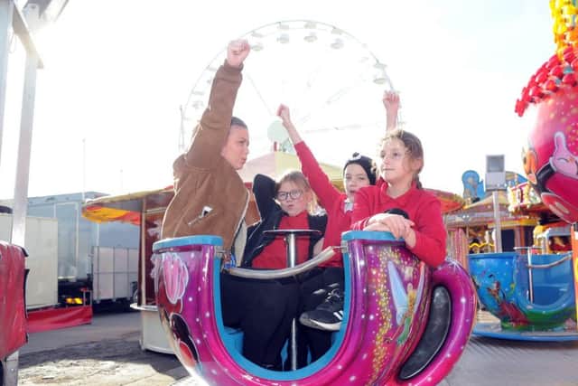 14 February  2019   ......  Children enjoy the rides at the opening of the great Leeds Valentines Fair at Ellenad Road. Picture Tony Johnson.