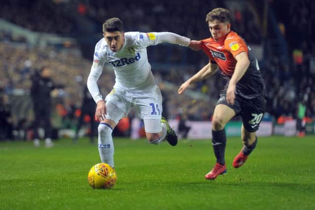 Pablo Hernandez grabs hold of Daniel James at Elland Road. PIC: Tony Johnson