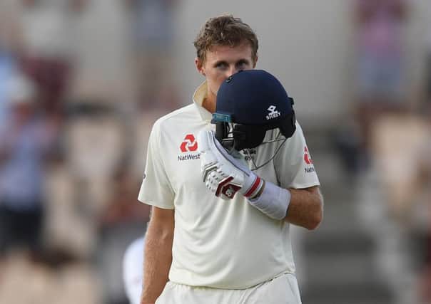 England captain Joe Root celebrates reaching his 100 during Day Three of the Third Test match between the West Indies and England at Darren Sammy Cricket Ground on February 11 in Gros Islet, Saint Lucia. (Picture: Shaun Botterill/Getty Images)