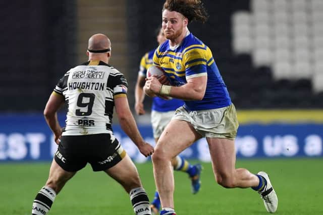Rhinos.
Rhinos Anthony Mullally takes on Hull's Danny Houghton.
Picture Jonathan Gawthorpe