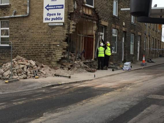 A man is receiving medical treatment for shock after a car ploughed into his home in the early hours of this morning.