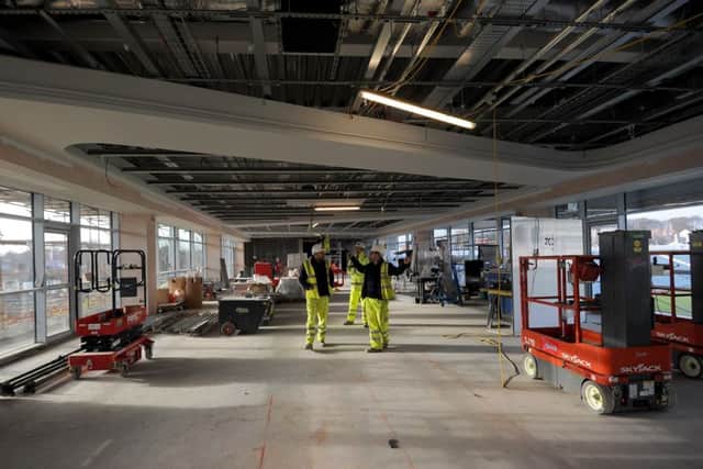 Work takes place on one of the new concourse's in the rebuilt North Stand at Emerald Headingley. Picture: Simon Hulme