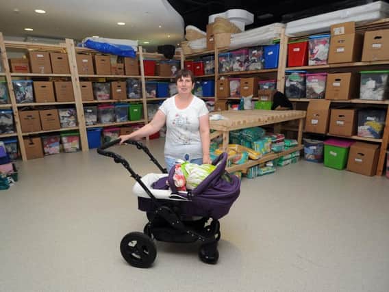 Leeds Baby Bank volunteer Jackie Appleton at the charitys city centre base in the St Johns Centre.