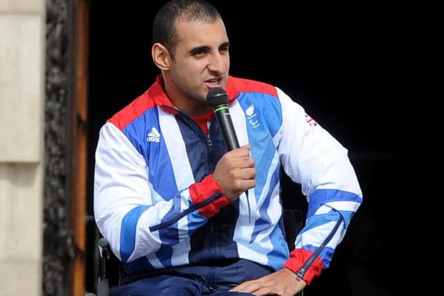Ali Jawad meets the crowds at the 
Olympic reception outside Leeds Civic Hall, Millennium Square, Leeds, in 2012.
