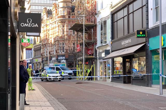 Commercial Street cordoned off after the manhole cover exploded. Photo: Charlottle Lacy.